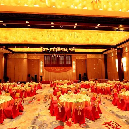 Gloria Grand Hotel Wuxi وكسي المطعم الصورة