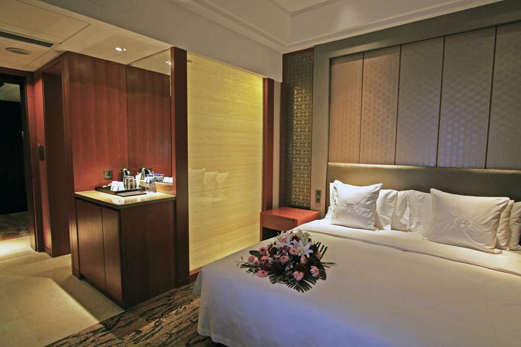 Gloria Grand Hotel Wuxi وكسي الغرفة الصورة