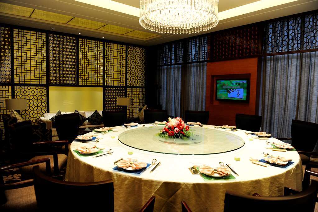 Gloria Grand Hotel Wuxi وكسي المطعم الصورة