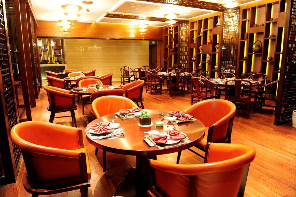 Gloria Grand Hotel Wuxi وكسي المطعم الصورة