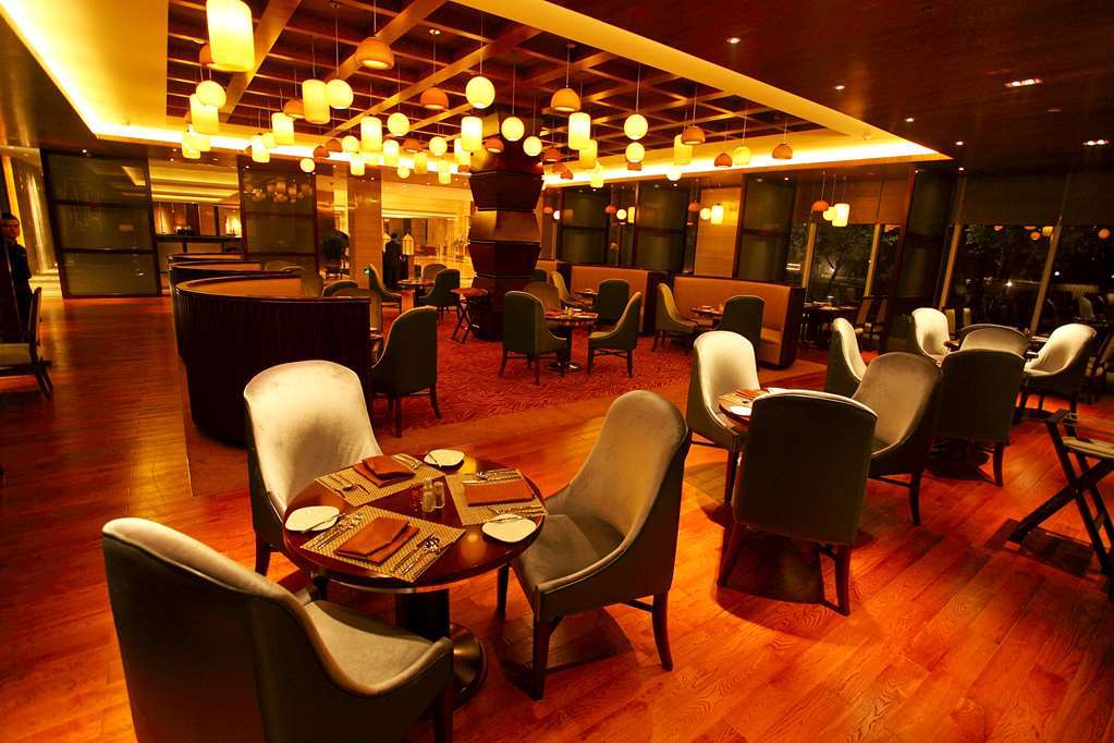 Gloria Grand Hotel Wuxi وكسي المطعم الصورة
