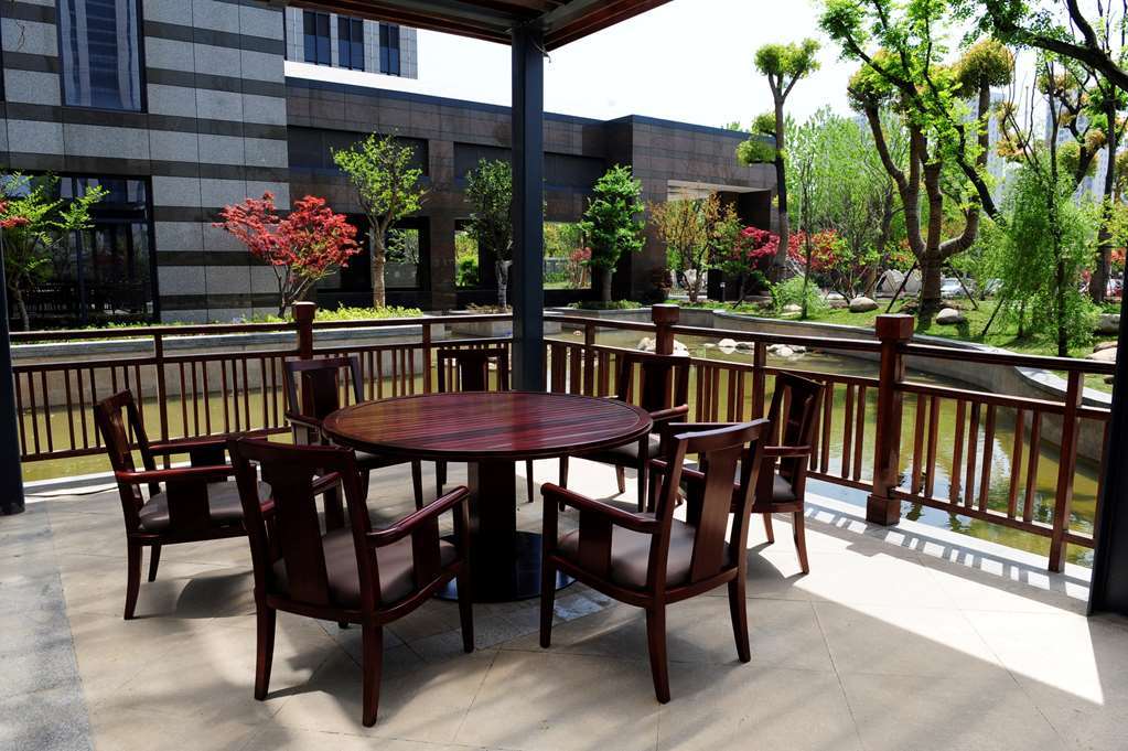 Gloria Grand Hotel Wuxi وكسي المطعم الصورة