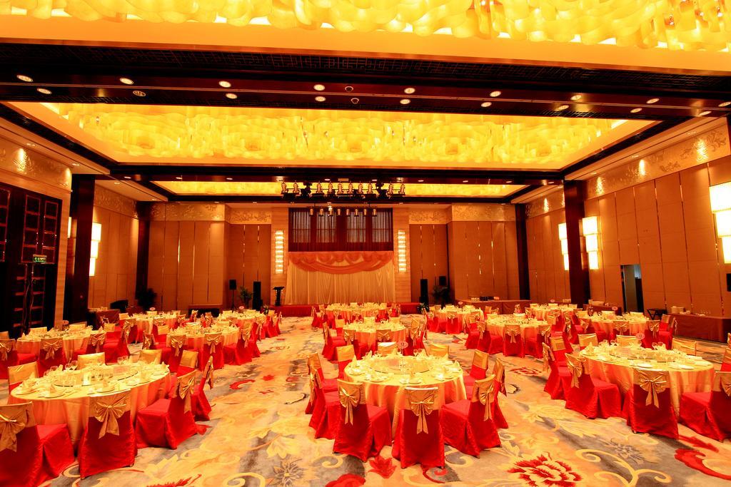 Gloria Grand Hotel Wuxi وكسي المطعم الصورة